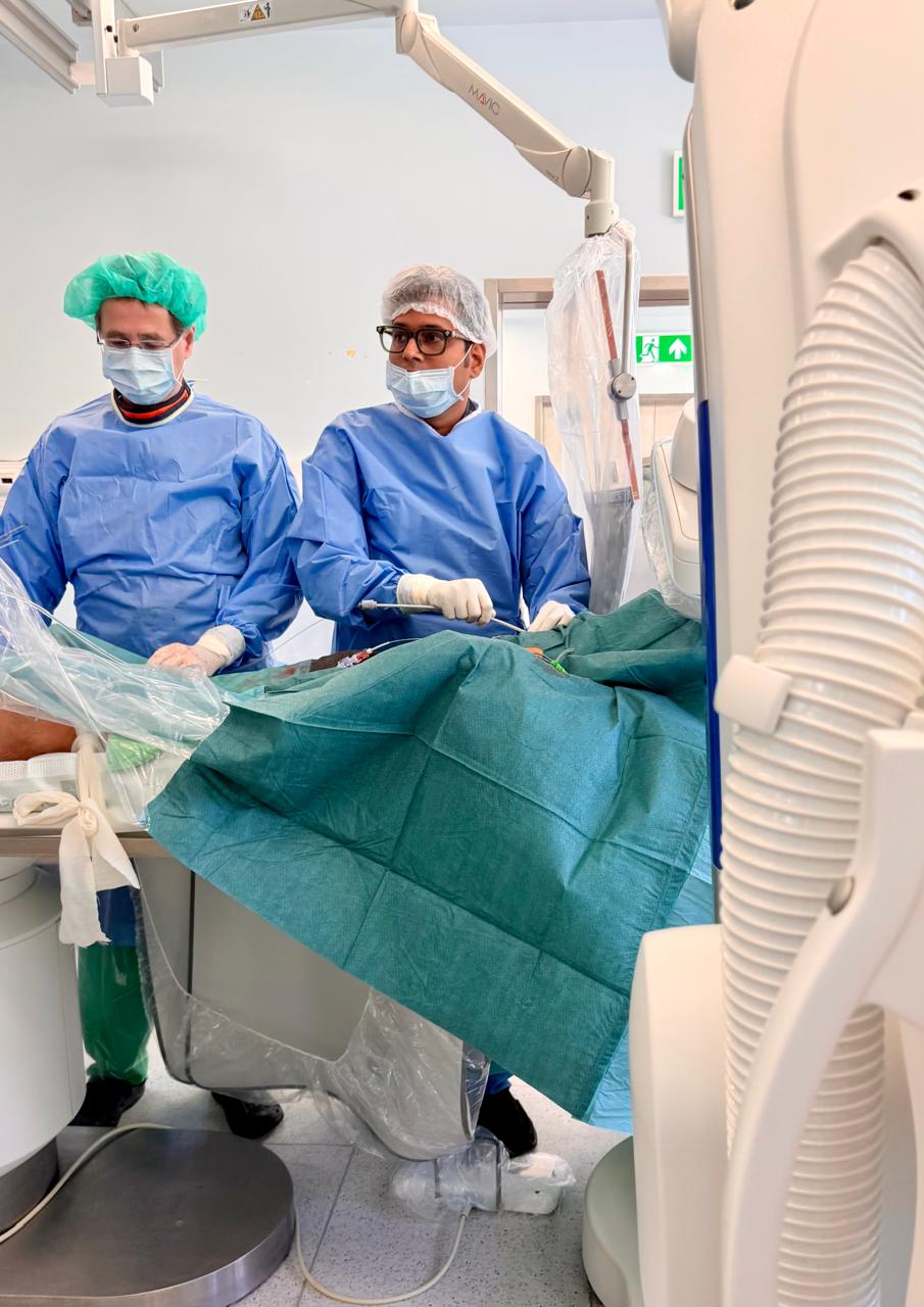 Dr. Gyana Ranjan Nayak and a colleague performing a structural heart procedure in the catheterization laboratory at GOKVI, Budapest.